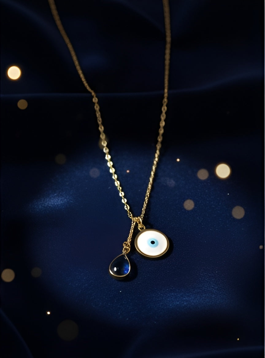 Gold Evil Eye Pendant with Blue Crystal Drop