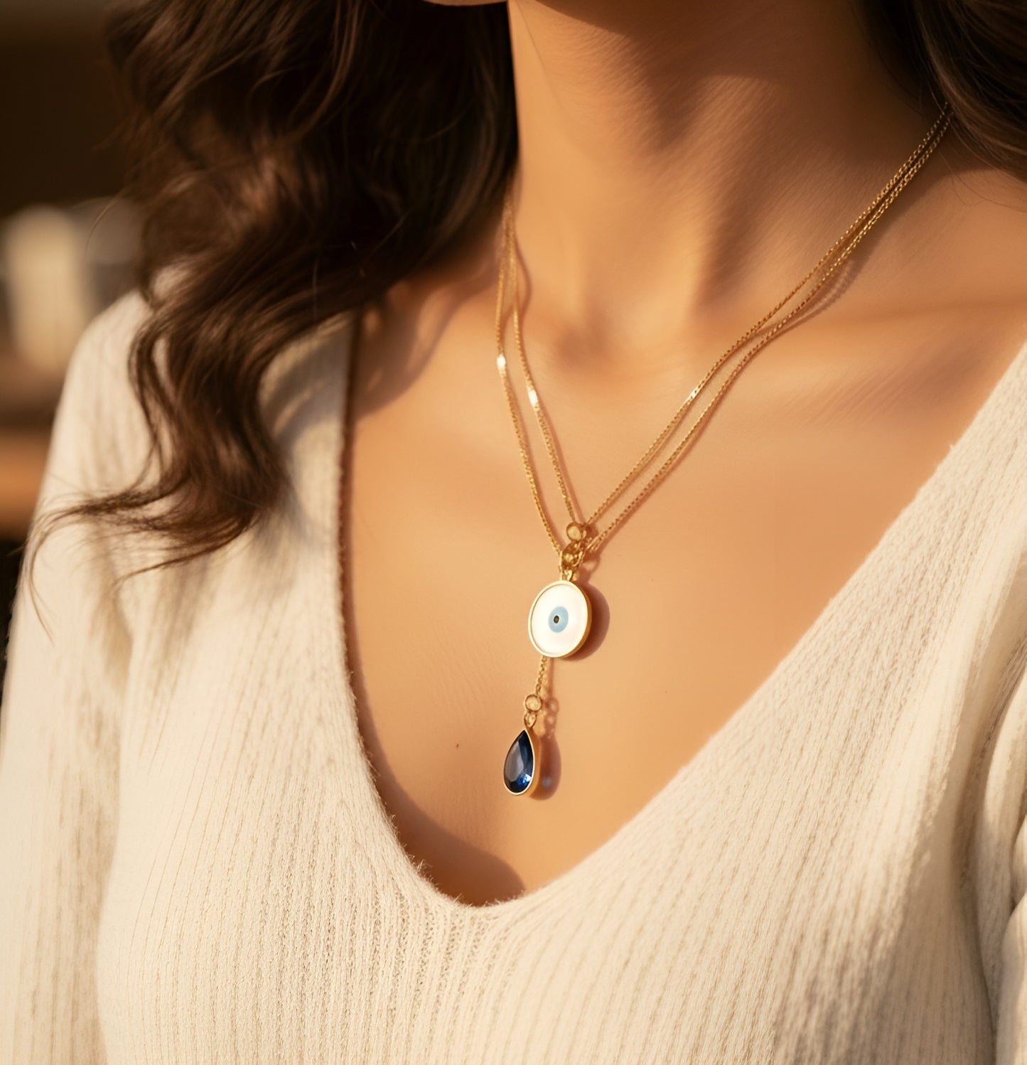 Gold Evil Eye Pendant with Blue Crystal Drop